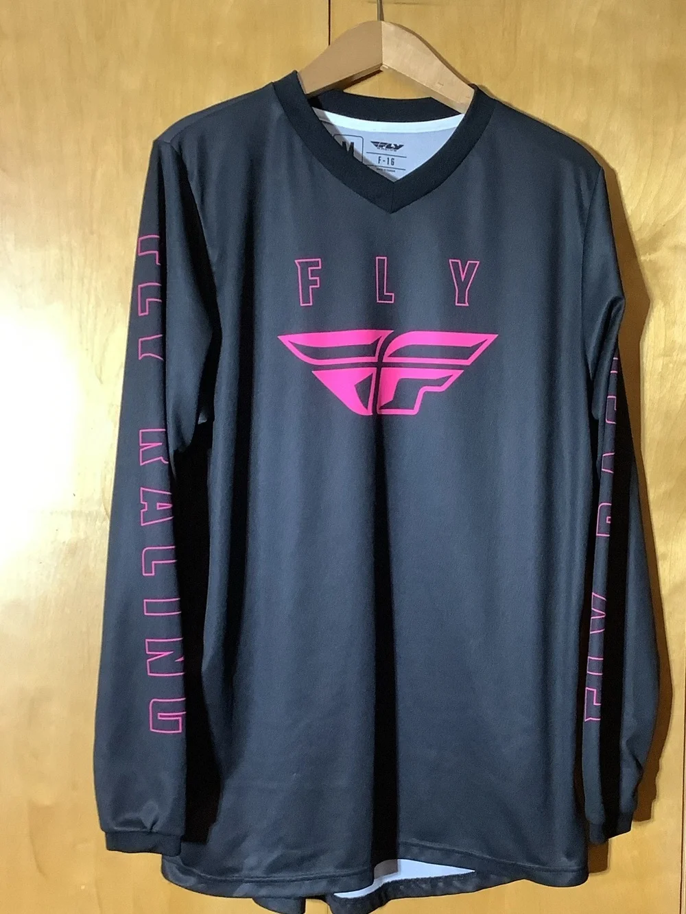 Fly Racing black and magenta performance tee, size medium